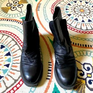 Black leather Naya Boots. Leather 8 inch shaft and synthetic rubber sole.